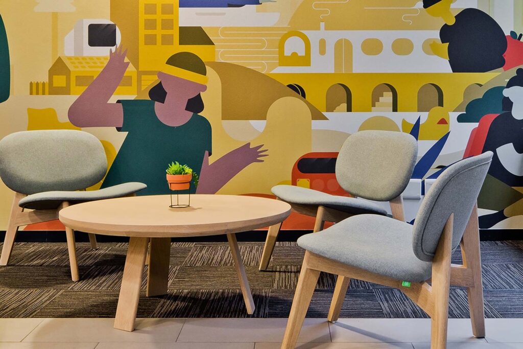 Valenture educational campus furnished with coffee tables, visitor chairs and other college furniture as part of an FF&E solution by Design Colab