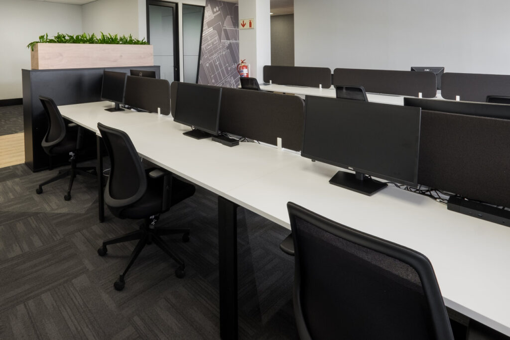 Atlas Copco Boksburg open-plan office with ergonomic chairs and FF&E desk solutions
