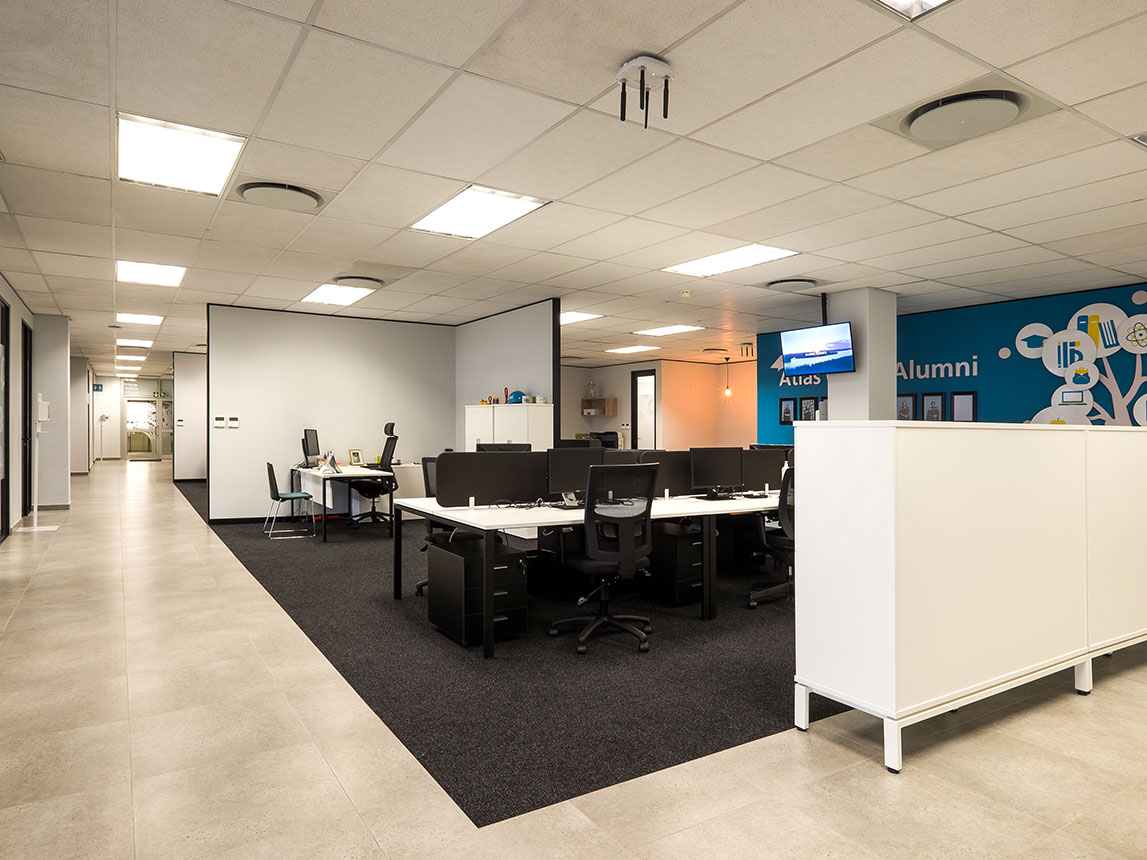 Atlas Copco South Africa open-plan office with shared desks, ergonomic office chairs and privacy screens