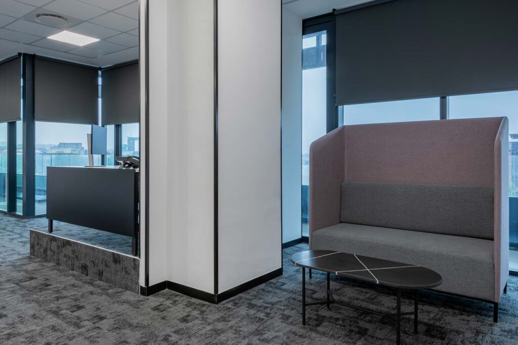 Call centre acoustic booth with privacy seating for focused collaboration, showcasing modern flexible workplace furniture and FF&E solutions
