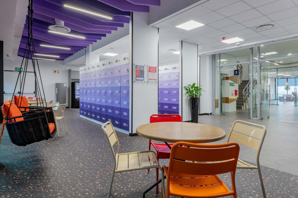 Large-scale call centre canteen with flexible seating and contemporary furniture solutions, showcasing specialist FF&E procurement