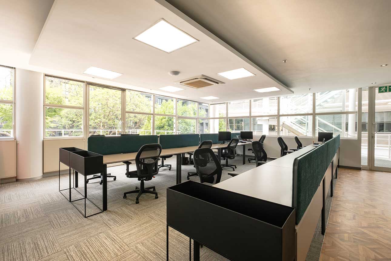 Letsema offices feature an open-plan layout with modular desks, ergonomic chairs, and shared desk systems.