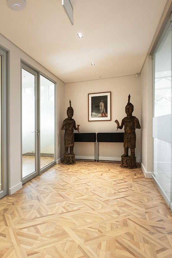 Letsema Business Consultancy office, showcasing African art and sculptures, furnished by Ff and e Solutions.