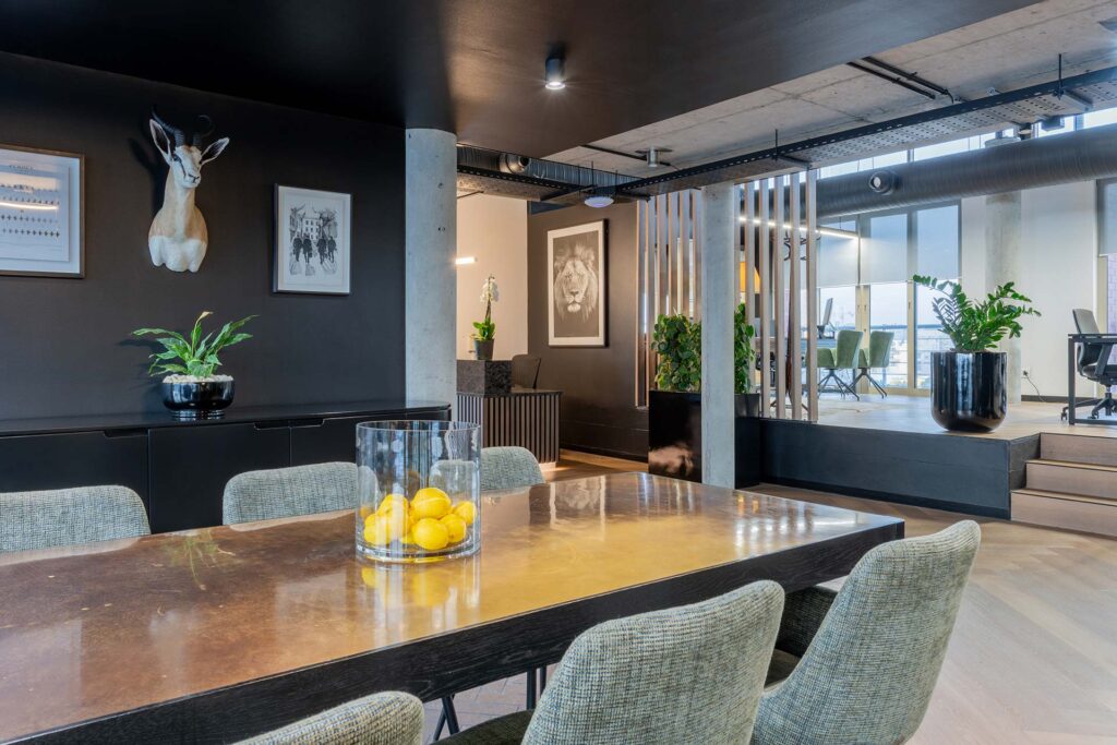 Lion Capital Cape Town luxury boardroom with contemporary chairs, timber table and refined décor, showcasing premium FF&E solutions