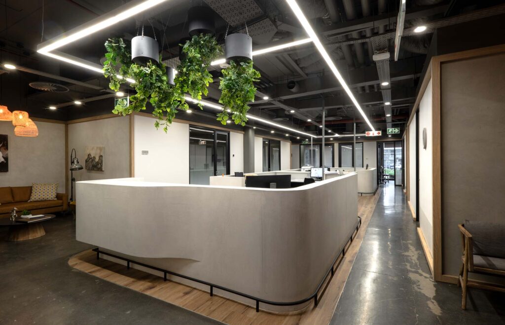 Design CoLab supplied a custom, curved, wooden reception desk for the Nephrology Johannesburg Clinic.