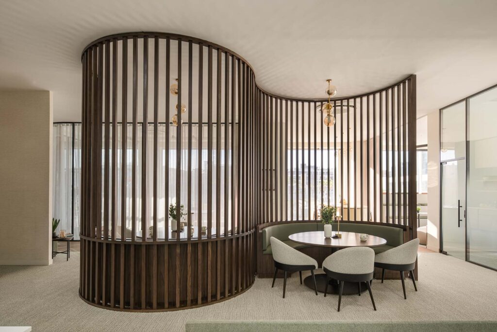 Soma Bay Cairo hospitality office with curved mint green bench seating for informal meetings and collaborative workplace furniture