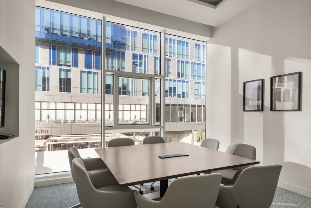Soma Bay Cairo office meeting room with square boardroom table, modern desks and ergonomic chairs