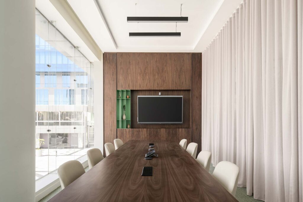 Soma Bay Cairo boardroom with custom table, décor, lighting and AV setup, delivered through specialist furniture procurement