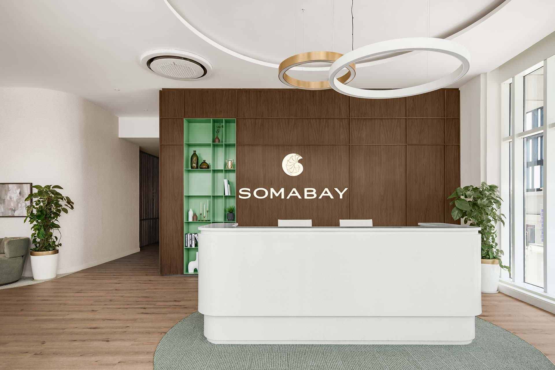 Soma Bay Cairo reception with custom high-end desk, décor, furniture and fixtures, delivered through Design Colab FF&E procurement