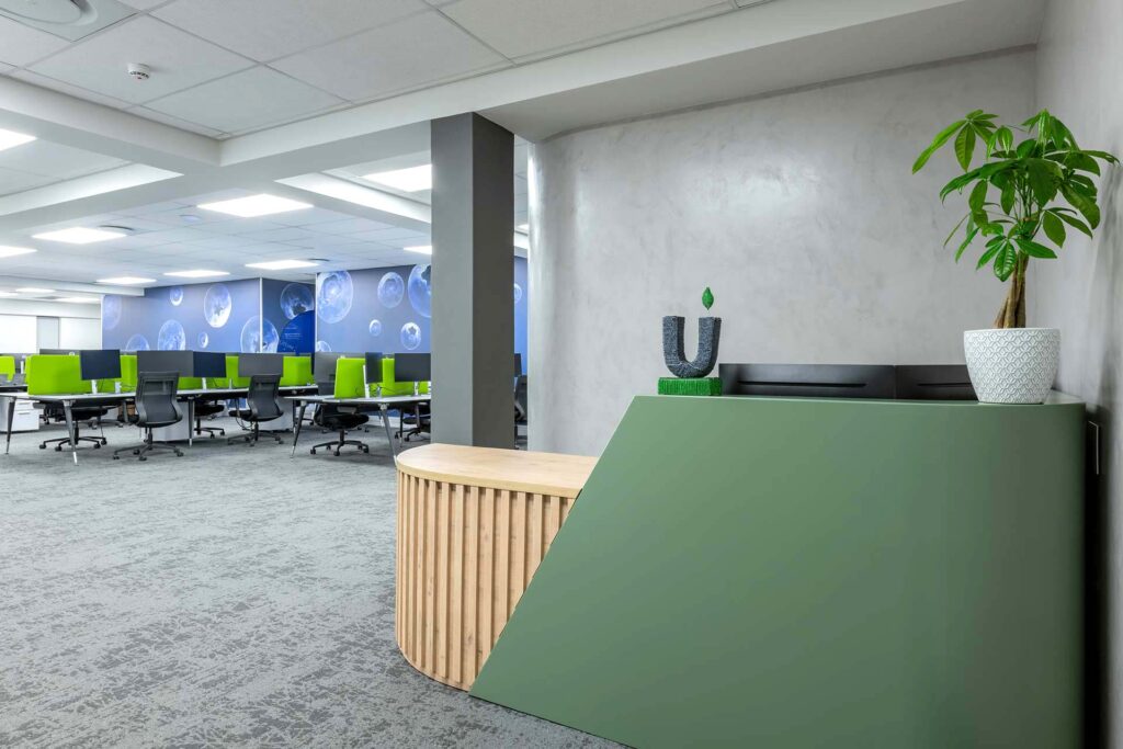 United Exports Paarl office reception with modern workstations, showcasing commercial furniture sourcing and FF&E solutions by Design Colab