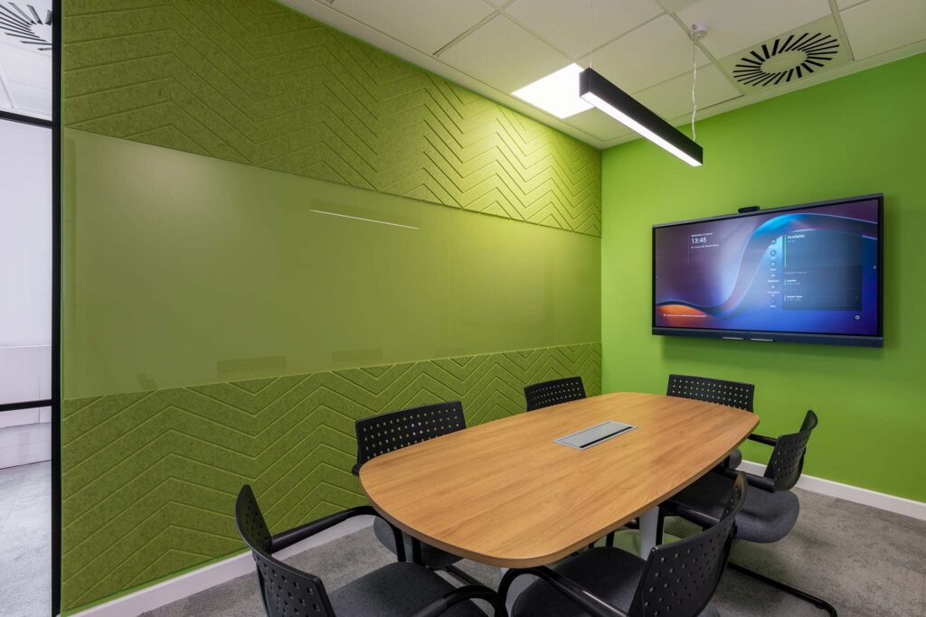 British Airways Euroflyer London small meeting room with contemporary table, chairs and custom acoustic panels, showcasing commercial office furniture solutions
